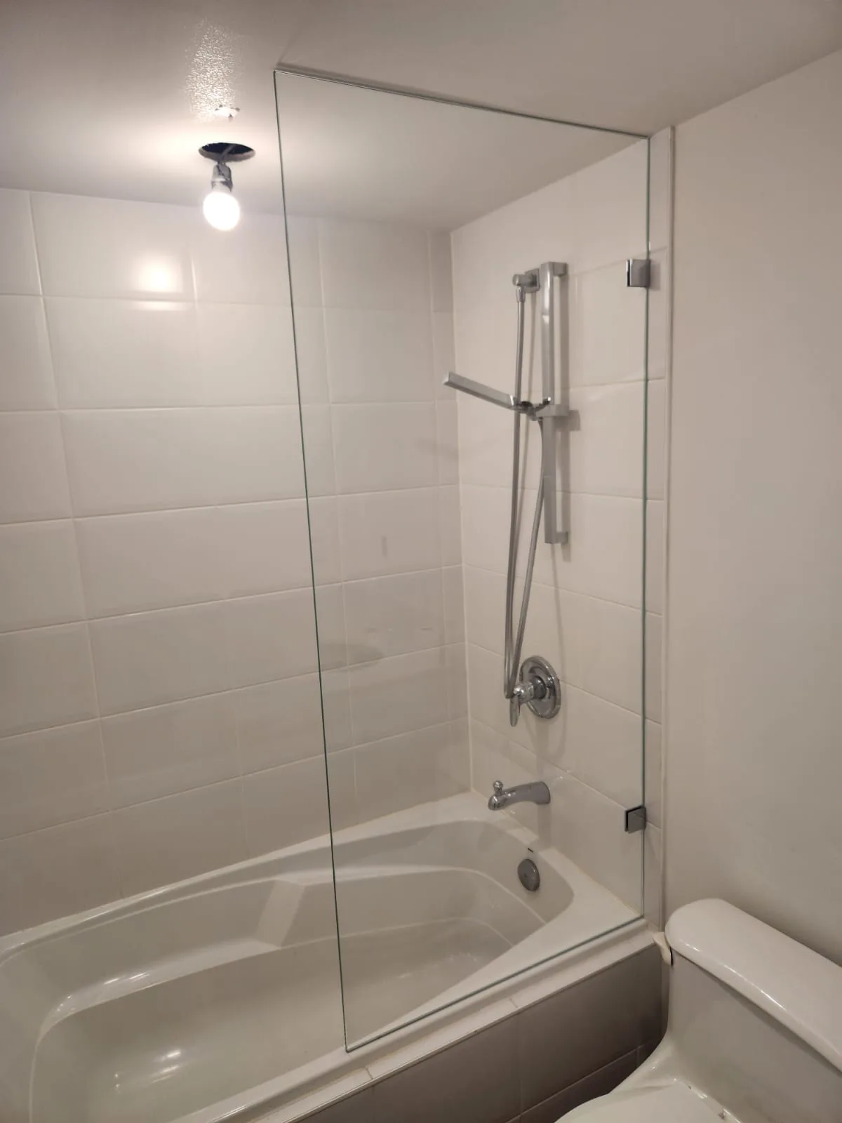 Low Iron Tub Panel Installation, Downtown Vancouver