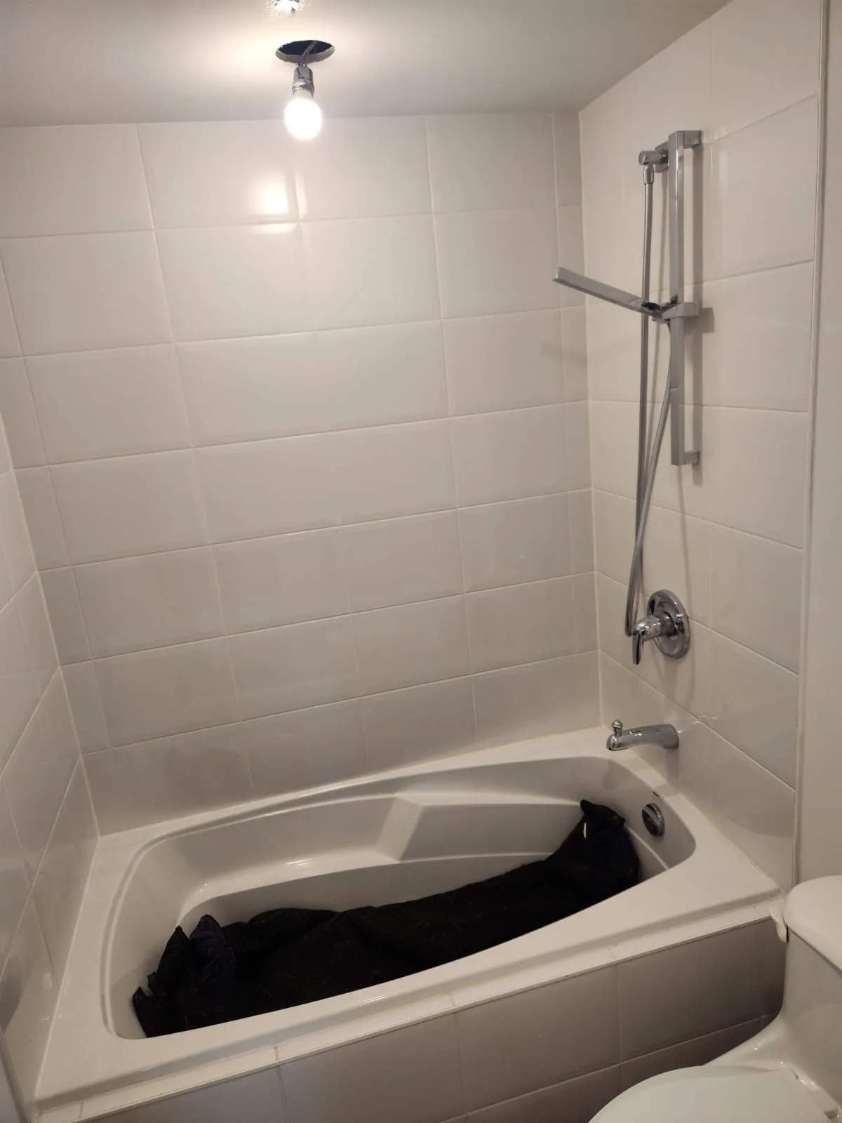 Before installation — alternate angle showing tub surround prior to glass panel fitting